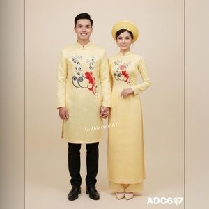 Elegant Yellow Áo Dài with Red and Blue Embroidery